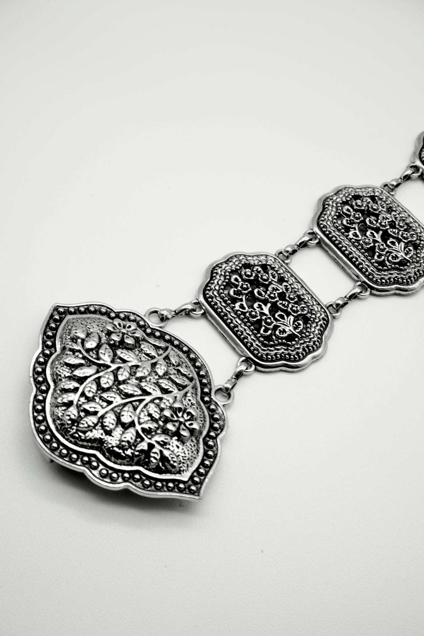 Cinturón cadena relieve