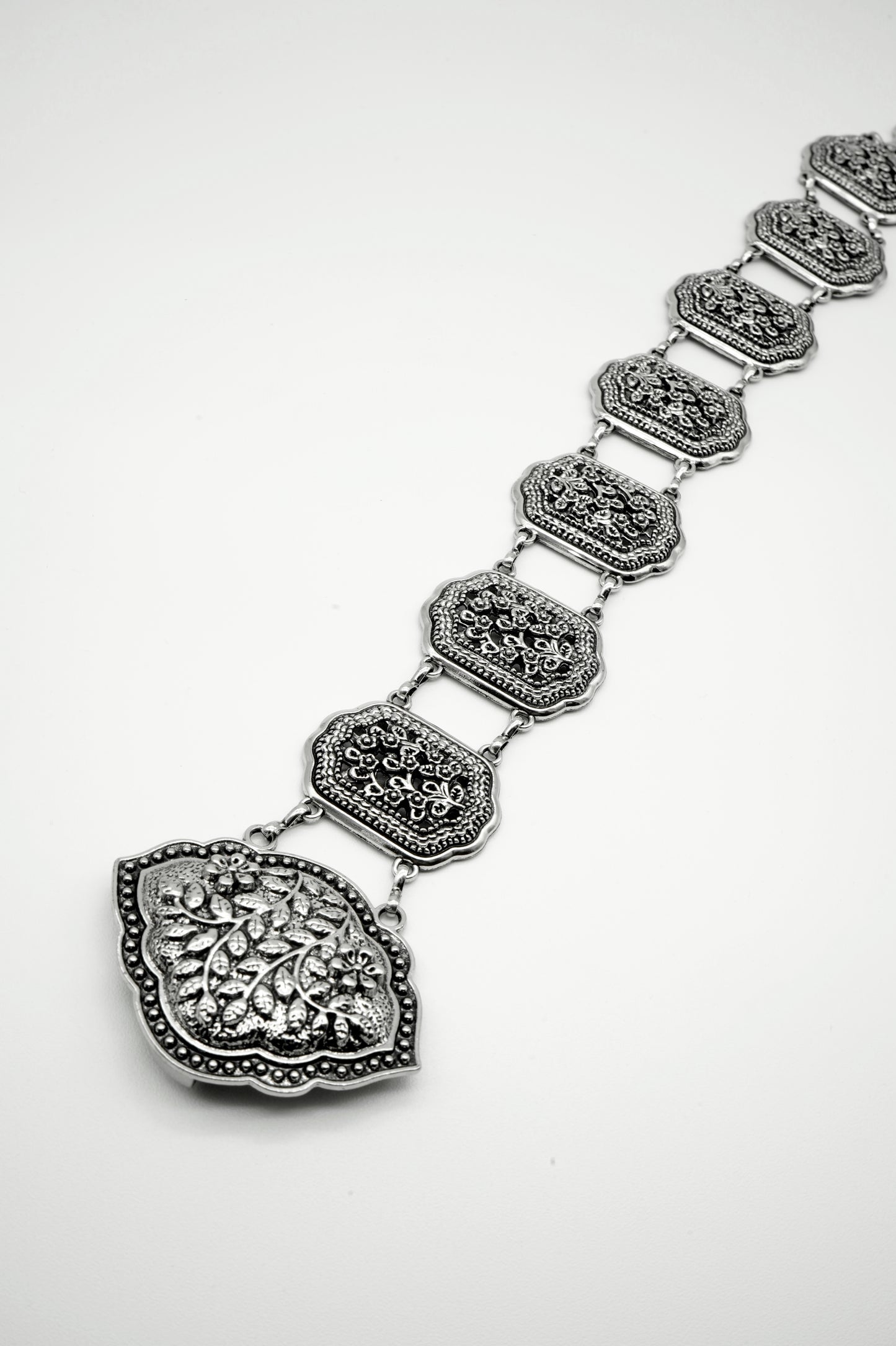 Cinturón cadena relieve